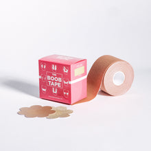 Load image into Gallery viewer, a roll of boob tape in nude color and nipple covers in nude color
