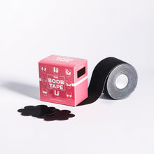 Load image into Gallery viewer, a roll of boob tape in black and nipple covers in black